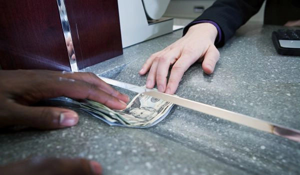 ACE offers ATM services withdrawing cash from a debit card