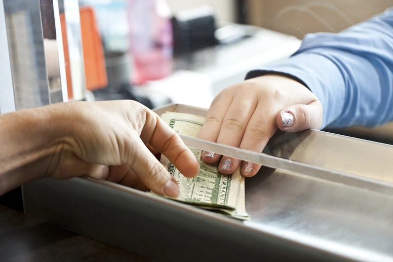consumer getting assistance with sending money