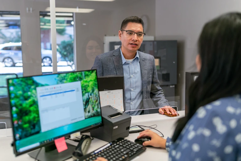 man speaking to an ACE store associate man speaking to an ACE store associate